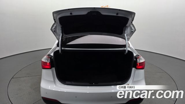 Kia K3 2013 — photo 26
