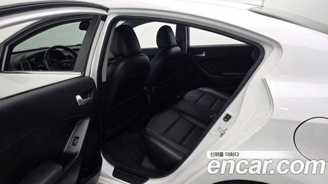 Kia K3 2013 — photo 16