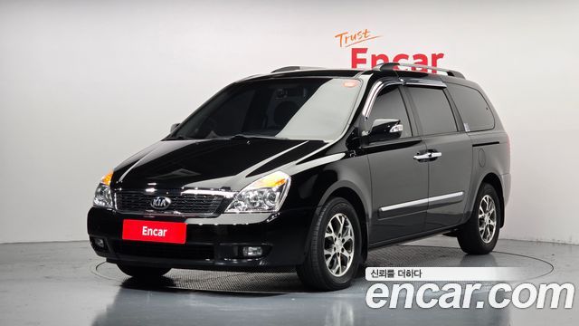 Kia Canival 2013 — photo 1