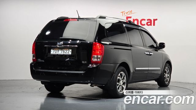 Kia Canival 2013 — photo 2