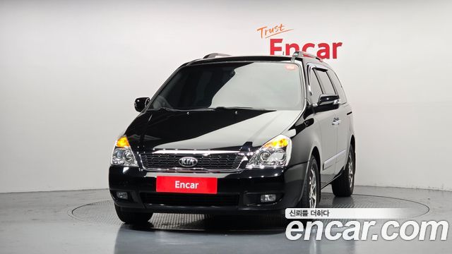 Kia Canival 2013 — photo 3