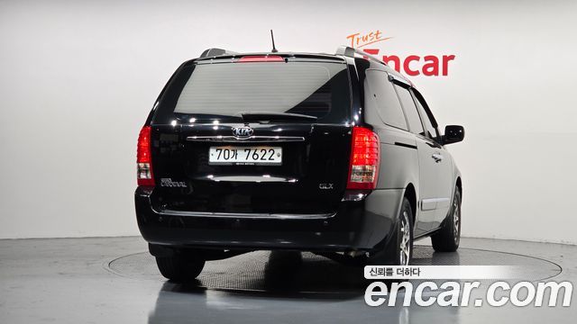 Kia Canival 2013 — photo 4