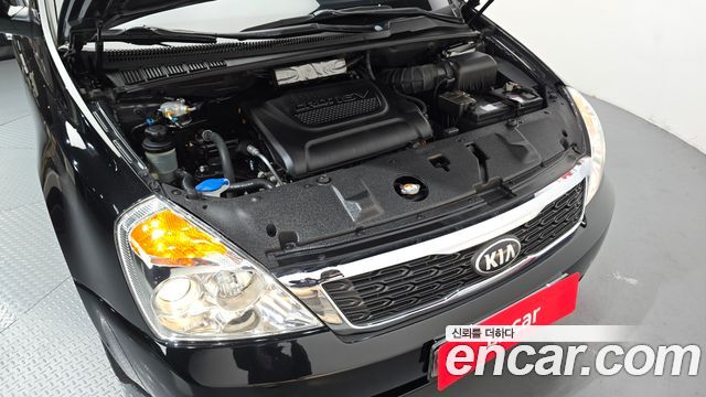 Kia Canival 2013 — photo 6