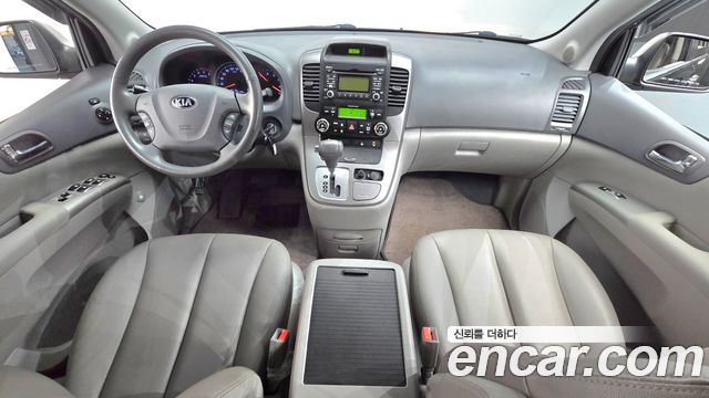 Kia Canival 2013 — photo 7