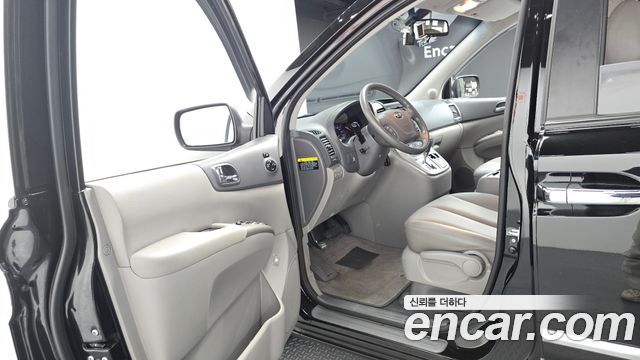 Kia Canival 2013 — photo 10