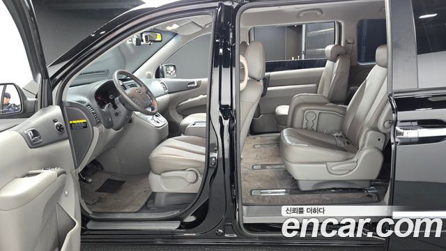 Kia Canival 2013 — photo 11