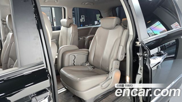 Kia Canival 2013 — photo 12
