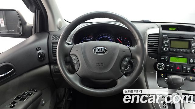 Kia Canival 2013 — photo 13