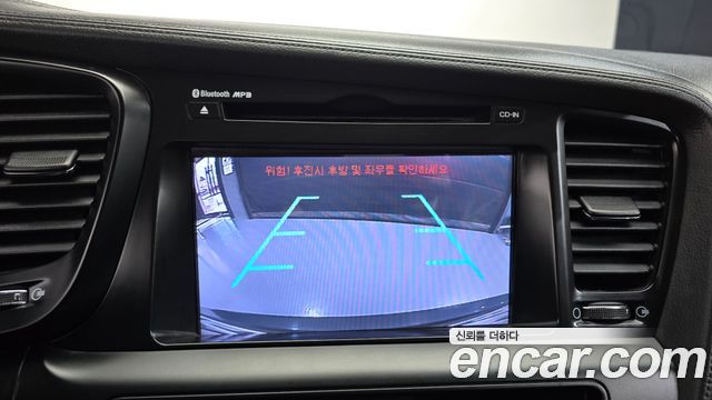 Kia K5 2011 — photo 14