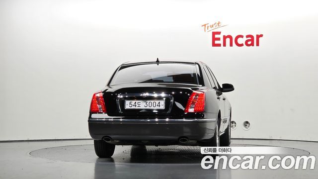 Kia OPIRUS 2009 — photo 4