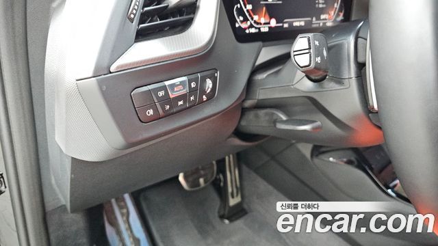 BMW 1-Series 2023 — photo 26