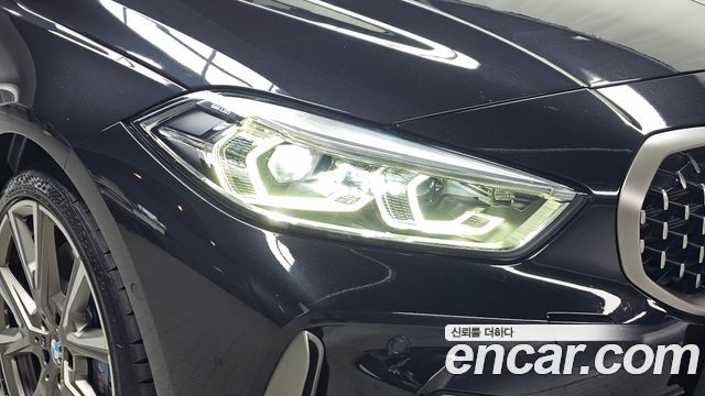 BMW 1-Series 2023 — photo 8