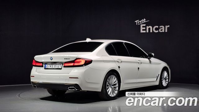 BMW 5-Series 2023 — photo 2
