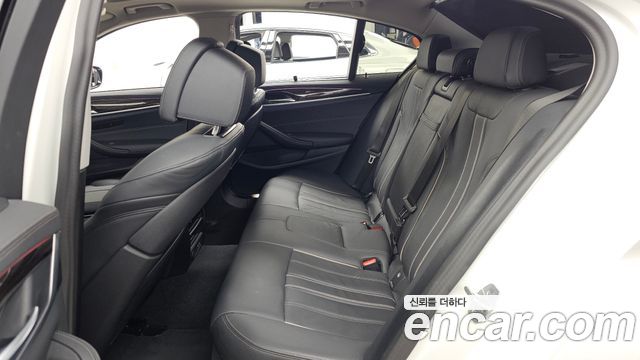 BMW 5-Series 2023 — photo 16