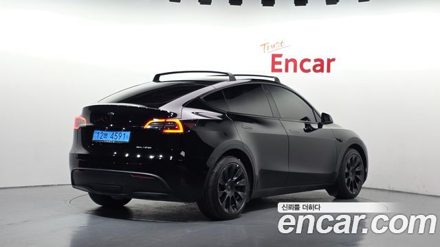 Tesla Model Y 2022 — photo 2