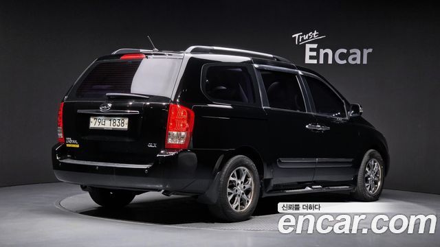 Kia Canival 2014 — photo 2