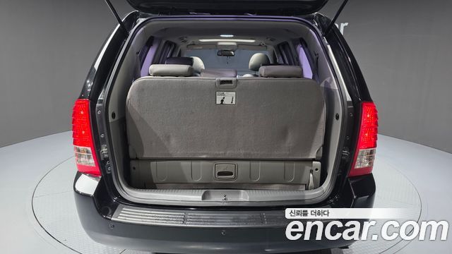 Kia Canival 2014 — photo 26