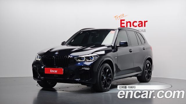 BMW X5 2021 — photo 1