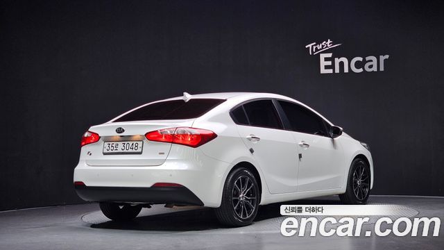 Kia K3 2013 — photo 2