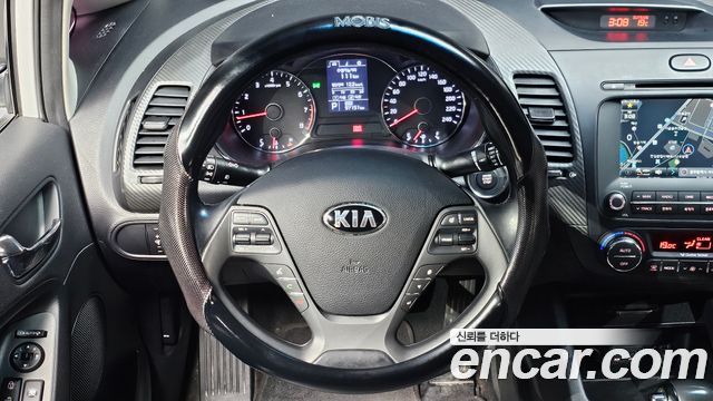 Kia K3 2013 — photo 21
