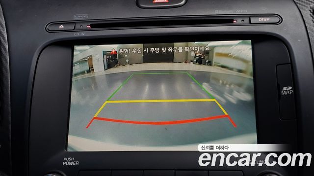 Kia K3 2013 — photo 25