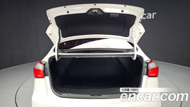 Kia K3 2013 — photo 30