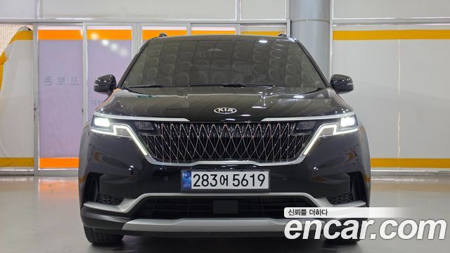 Kia Canival 2021 — photo 2