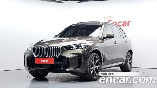 BMW X5 2024 — photo 1