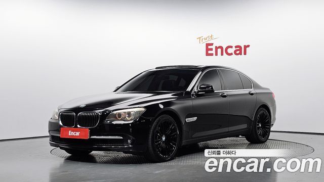 BMW 7-Series 2011 — photo 1