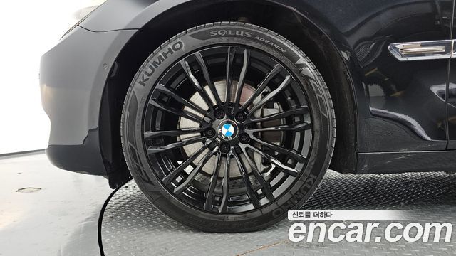 BMW 7-Series 2011 — photo 5