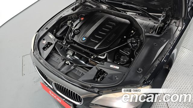 BMW 7-Series 2011 — photo 6
