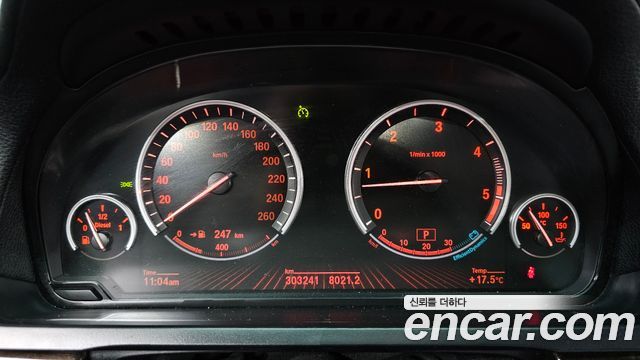 BMW 7-Series 2011 — photo 8