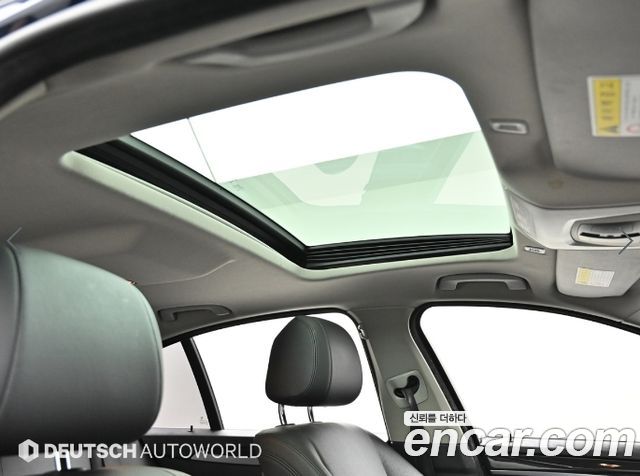 BMW 5-Series 2014 — photo 18