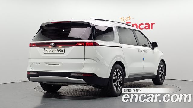 Kia Canival 2021 — photo 2