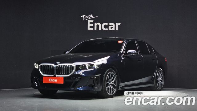 BMW 5-Series 2024 — photo 1
