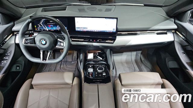 BMW 5-Series 2024 — photo 10