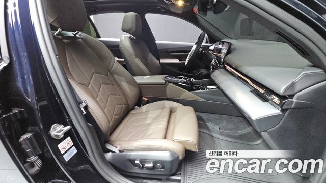 BMW 5-Series 2024 — photo 17
