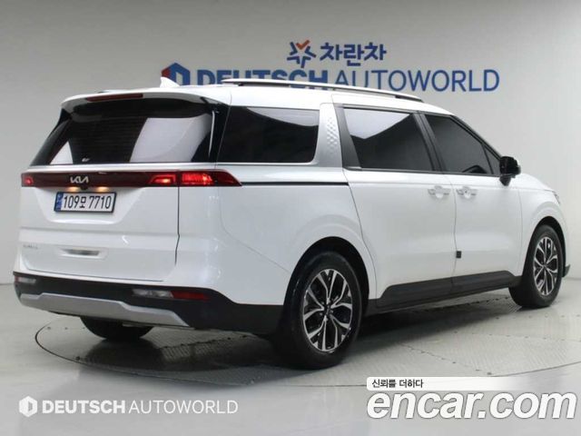 Kia Canival 2023 — photo 2