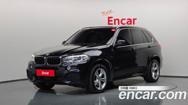 BMW X5 2018 — photo 1