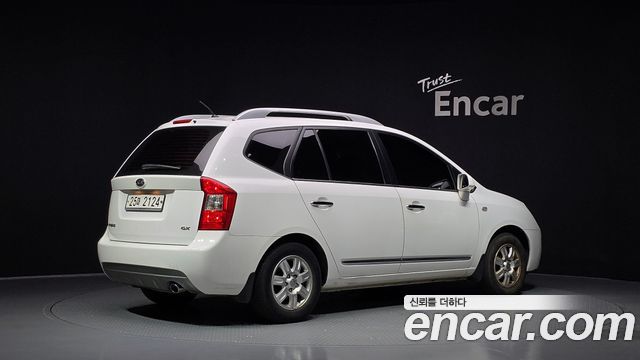 Kia Carens 2011 — photo 2