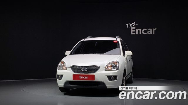 Kia Carens 2011 — photo 3