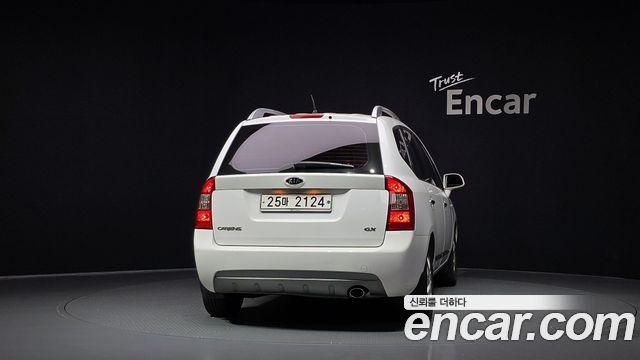 Kia Carens 2011 — photo 4