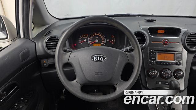 Kia Carens 2011 — photo 13