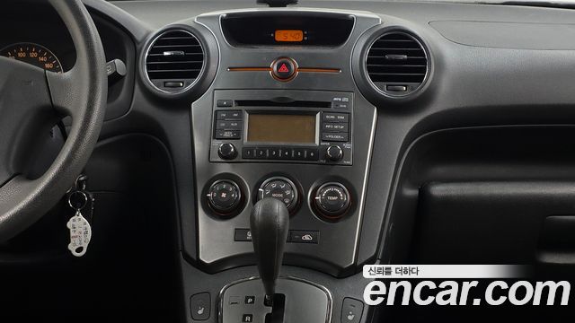Kia Carens 2011 — photo 14