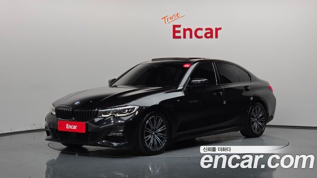 BMW 3-Series 2022 — photo 1