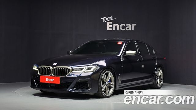 BMW 5-Series 2022 — photo 1