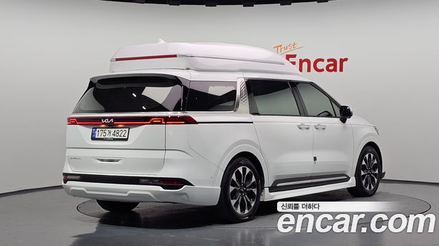 Kia Canival 2023 — photo 2