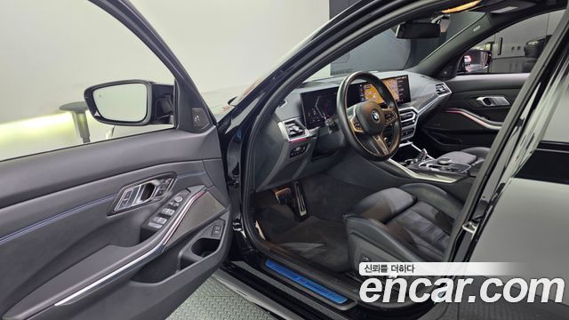 BMW 3-Series 2023 — photo 13