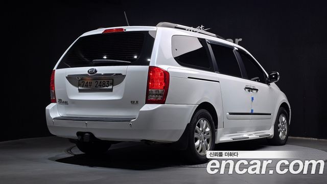 Kia Canival 2013 — photo 2