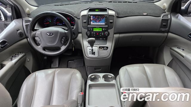 Kia Canival 2013 — photo 10